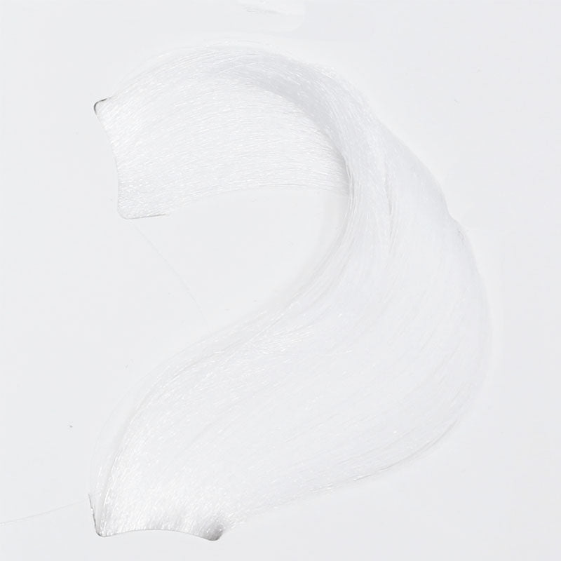 Smooth white cream swatch on clean background, showcasing texture for skincare or makeup use