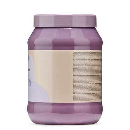 Purple jar of violet bleaching powder for safe hair lightening, featuring multilingual label and patented formula.