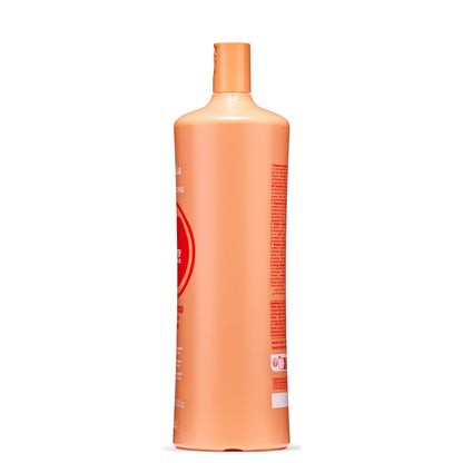 Orange bottle of energizing shampoo for fine hair, made in Italy, with red label details