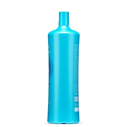Blue bottle of gentle shampoo for sensitive scalp and hair, made in Italy, with multilingual label