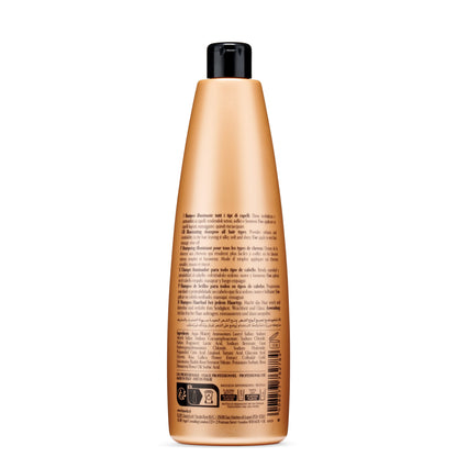 Illuminating shampoo for all hair types, golden bottle with multilingual label, made in Italy
