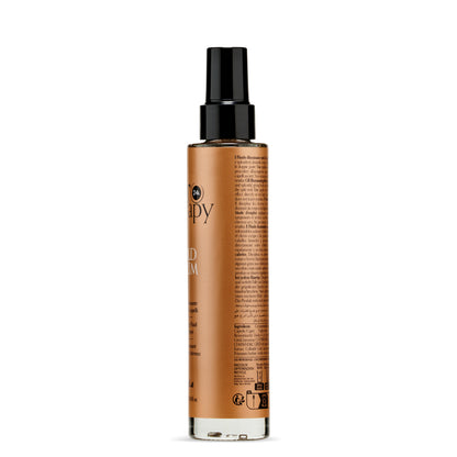 24k Gold Hair Serum in sleek amber bottle with black spray nozzle, illuminating fluid for all hair types