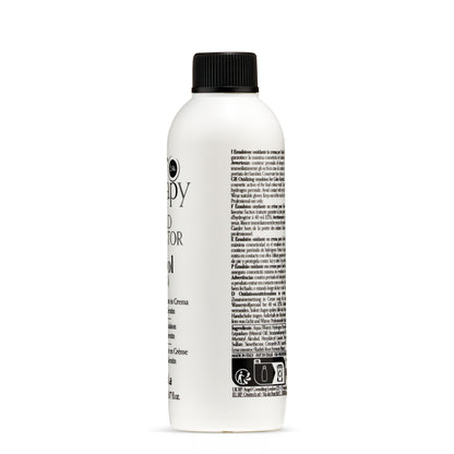 White bottle of 24k hair color oxidizing emulsion with black cap, professional salon use, made in Italy