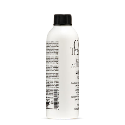 White bottle of 40 volume hair developer with black cap, professional hair coloring oxidizing emulsion