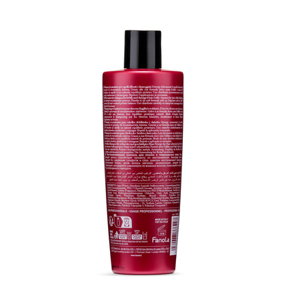 Red Fanola reconstructive shampoo bottle for damaged hair, sulfate-free formula, made in Italy