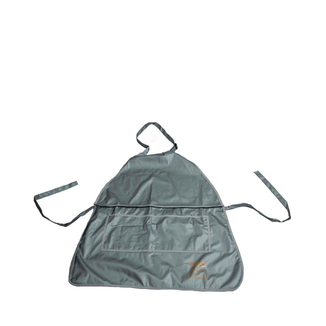 Gray salon apron with front pocket for hairdressers and beauty professionals