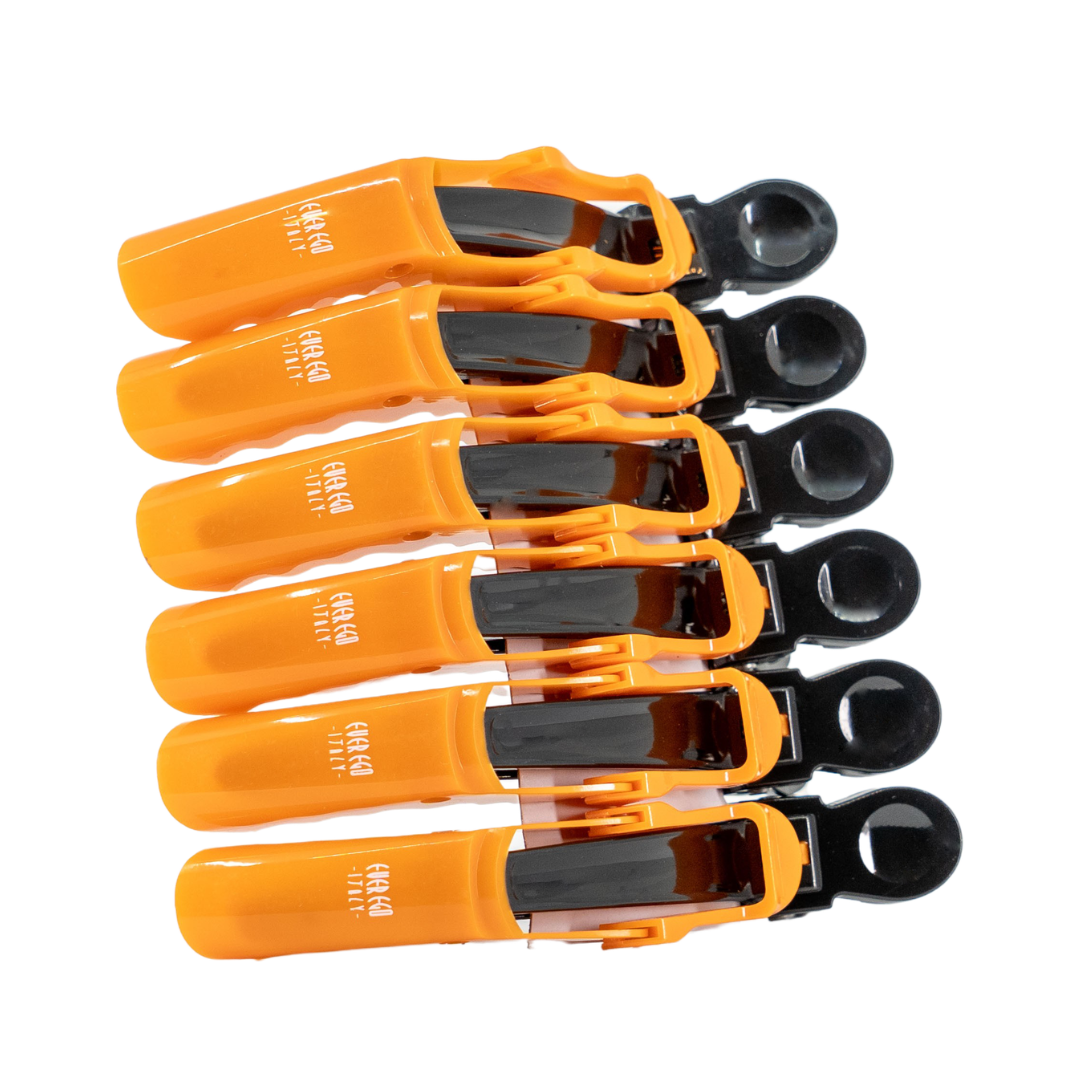 Orange and black hair clips for styling, salon-grade grip tools