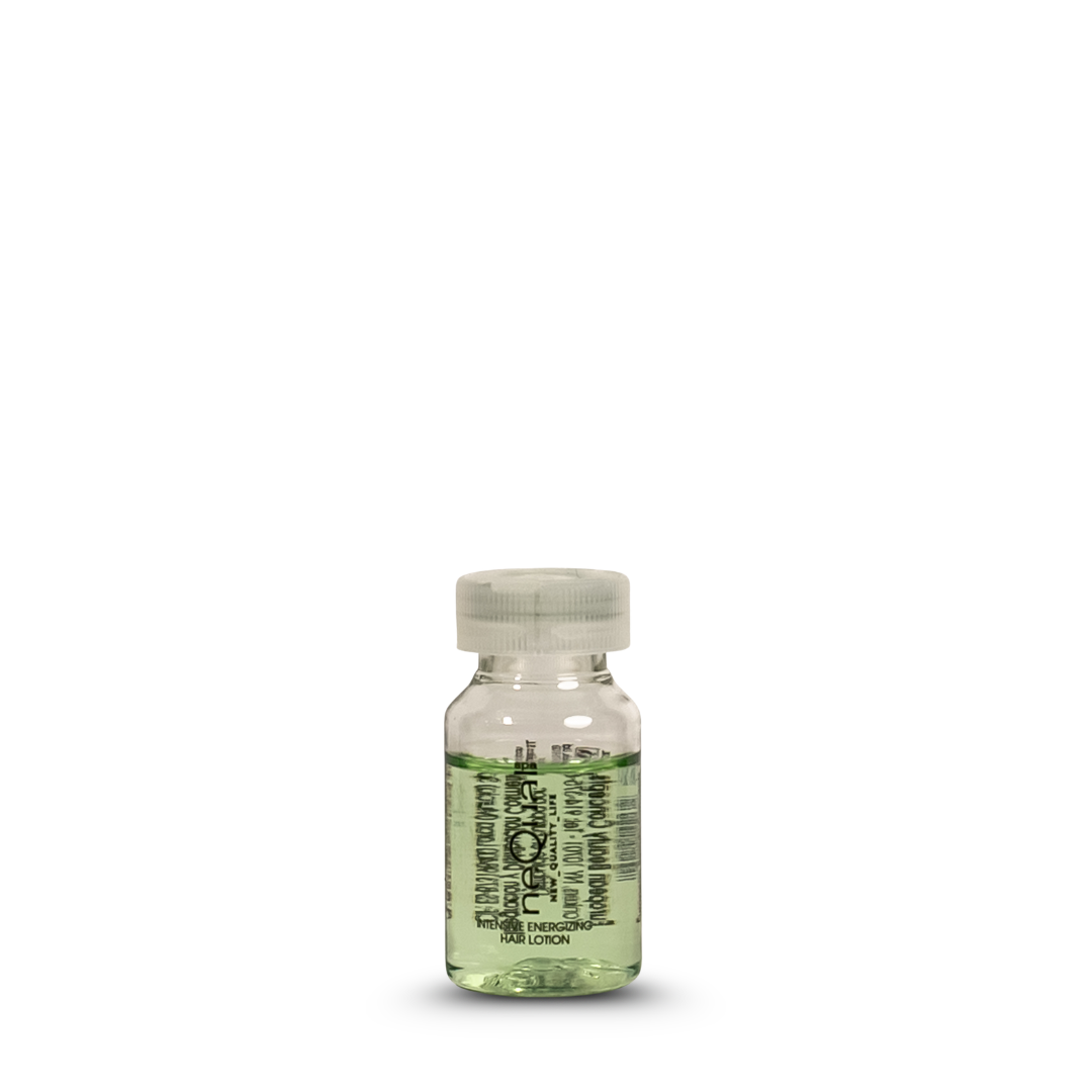 Intense energizing hair lotion in clear bottle with green liquid, European beauty product for scalp care