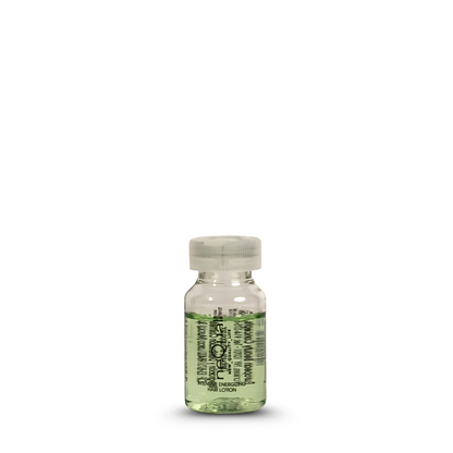 Intense energizing hair lotion in clear bottle with green liquid, European beauty product for scalp care