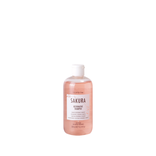 Sakura Restorative Shampoo, 100% vegan, 98% natural ingredients, 300ml bottle with pink liquid