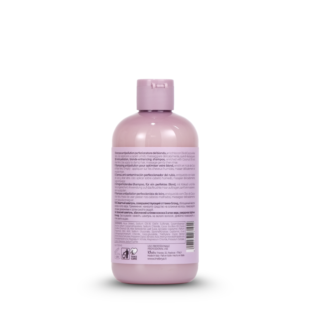Blonde-enhancing shampoo bottle with multilingual label, enriched with coconut oil and aloe vera for hair care