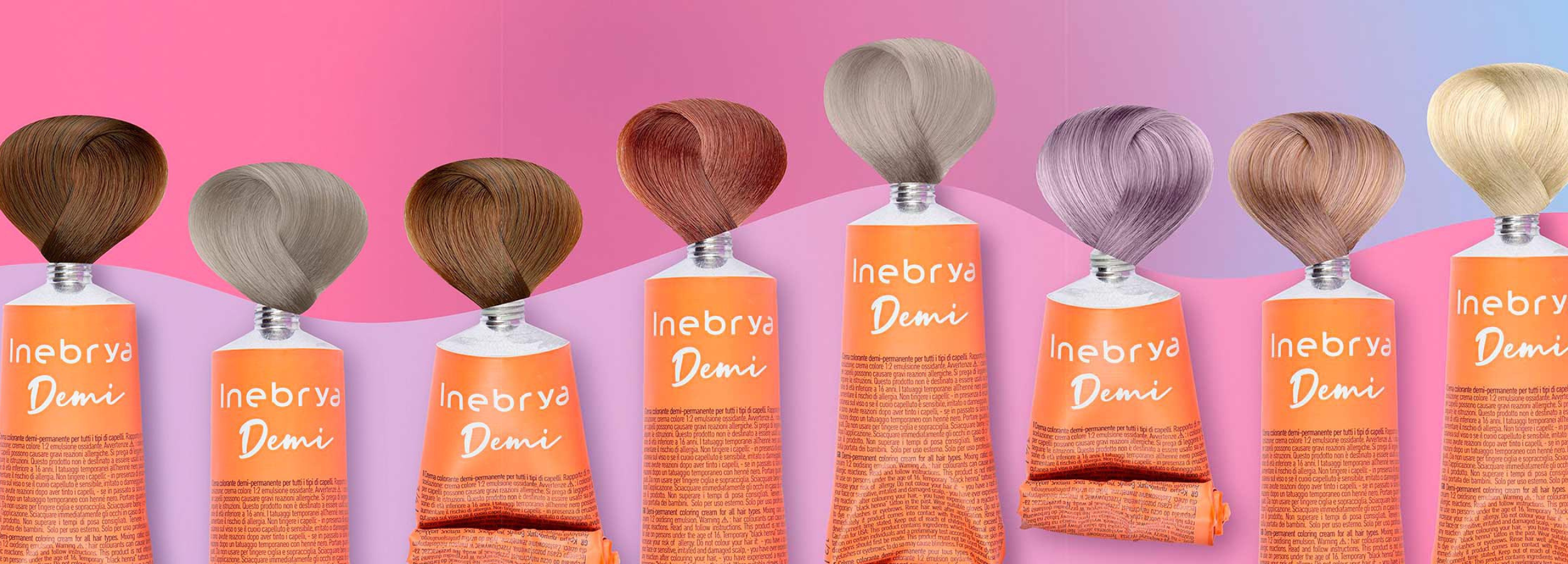 Inebrya Demi hair color tubes with swatches in brown, gray, red, purple, blonde shades on pink background