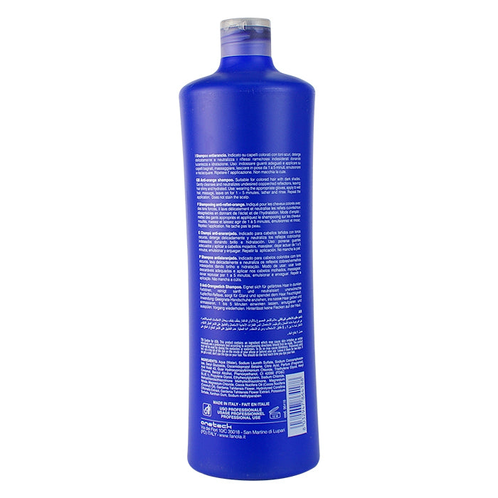 Blue bottle of professional hair shampoo with multilingual instructions, made in Italy for color-treated hair care